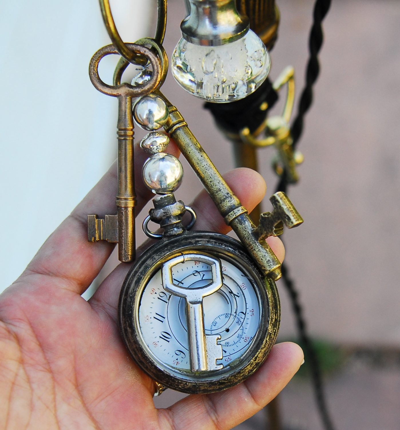 Trumpet Lamp, Time for Change, detail clock & keys, 2016